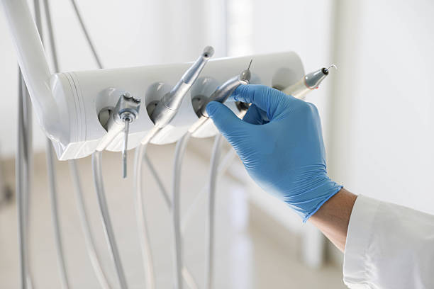 Professional Tooth Extraction technician working in St. Elmo, IL